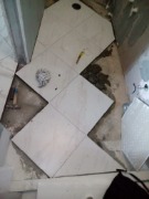 Монтаж плитки в ванной комнате